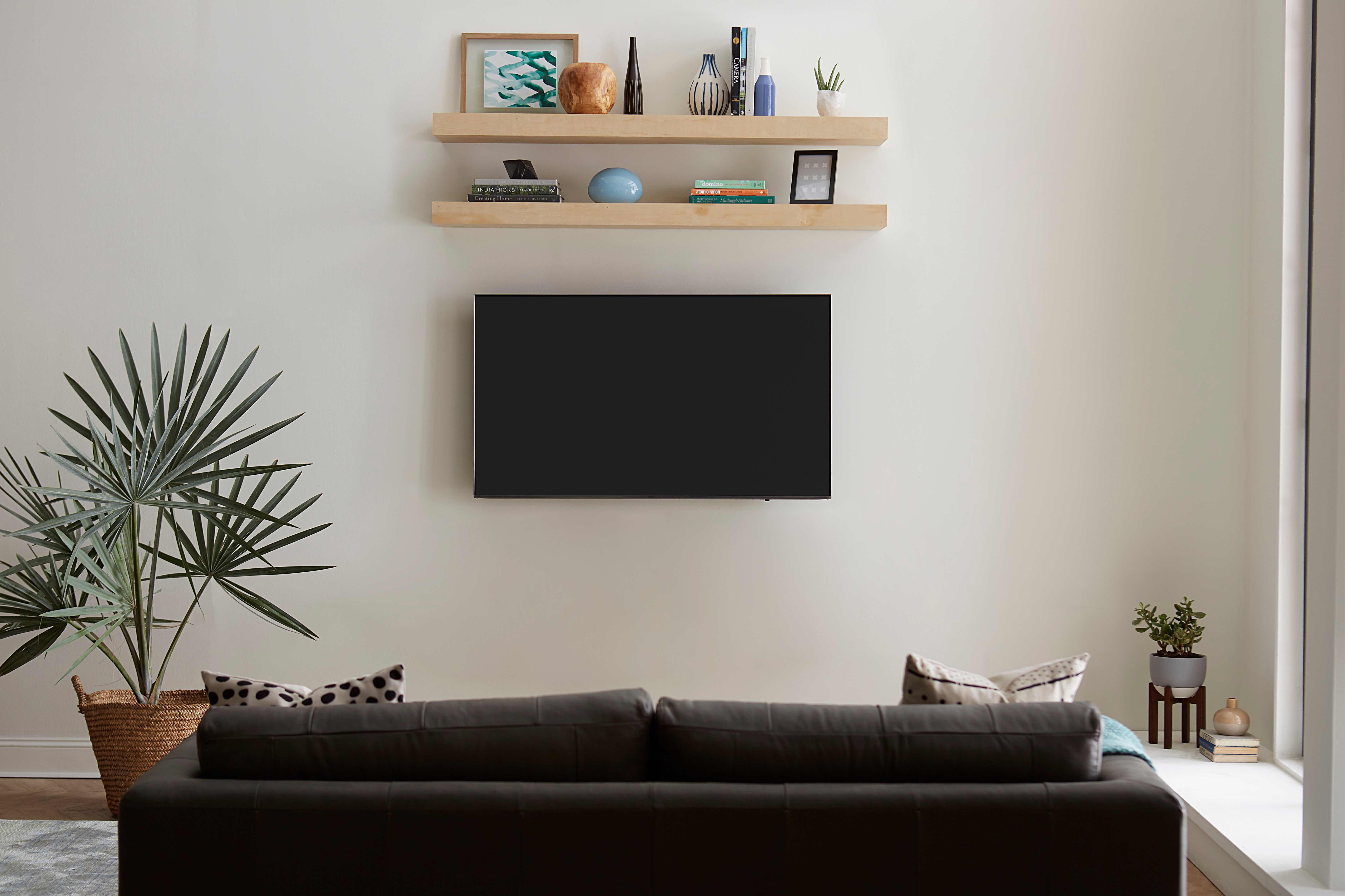 Floating Shelves Above TV