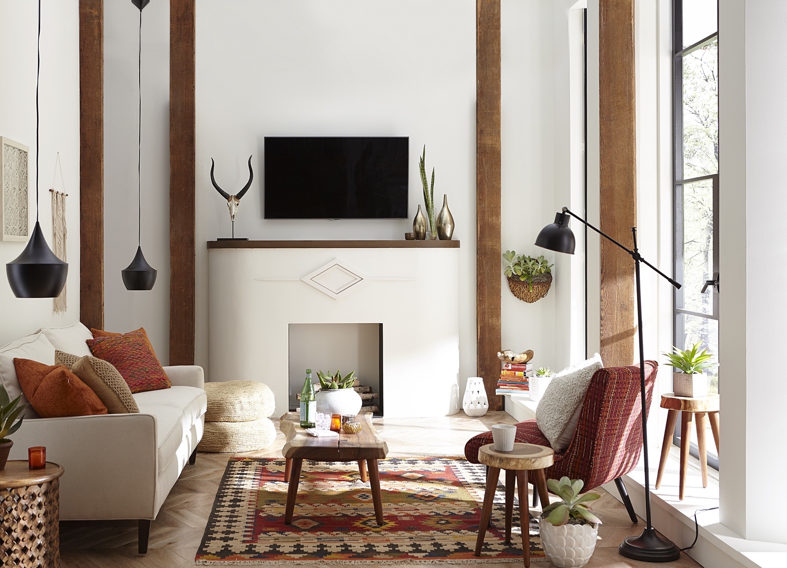 TV mounted over fireplace southwest style room