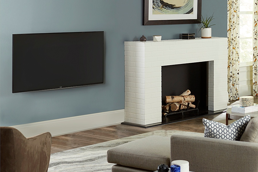 tv beside fireplace